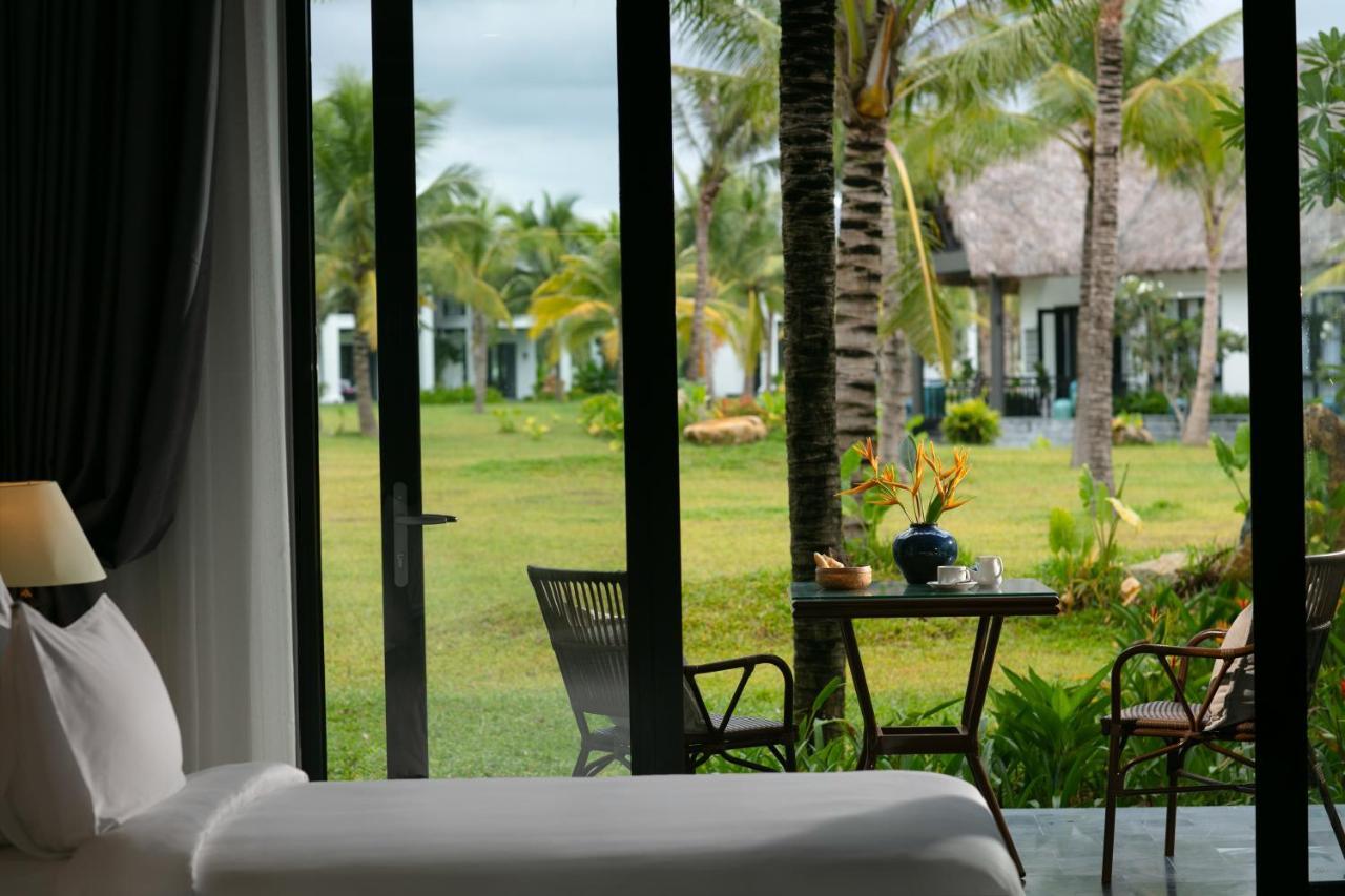 Bliss Hoi An Beach Resort & Wellness Exterior photo